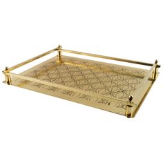 a gold tray with writing on it