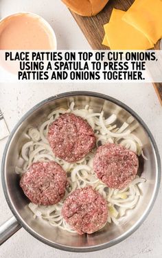 some meatballs are cooking in a pan with noodles and sauces on the side