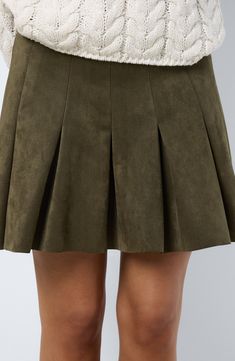 Sharp pleats lend a preppy edge to this miniskirt made from buttery faux suede. 15" length (size Medium) Hidden side-zip closure Unlined 92% polyester, 8% elastane Machine wash, line dry Imported Fall Pleated Hem Skirt Skort, Fall Pleated Hem Skort, Preppy Mini Pleated Skirt For Fall, Preppy Lined Skort For Fall, Preppy Lined Mini Skirt For Fall, Fall Preppy Mini Pleated Skirt, Preppy Short Mini Skirt For Fall, Preppy Lined Tennis Skirt For Fall, Fall Mini Hem Lined Skort