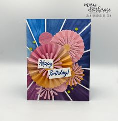 a birthday card with paper flowers on it