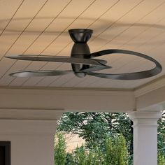 a ceiling fan on the outside of a house