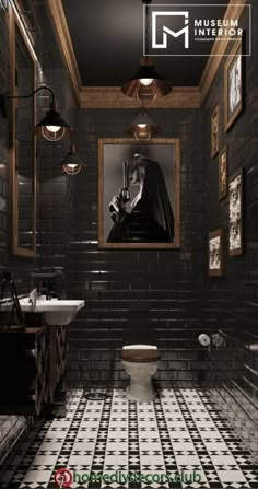 a black and white tiled bathroom with a painting on the wall above the toilet seat