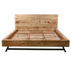 the bed frame is made out of wood and has black metal legs on each side