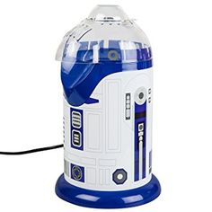 a star wars r2d2 lamp is plugged into a charger with a cord