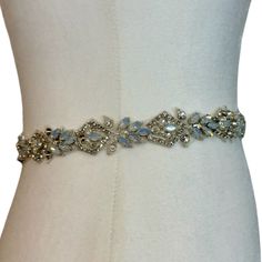 Beautiful Crystal Opal Wedding Dress Belt! Crystal Opal Bridal Belt Excellent Unused Condition! The Photos Do Not Do The Crystals Justice; They Shimmer Beautifully! This Belt Is Elegant And Can Elevate Any Dress. Has Sparkling Crystals, Opal Like Jewels, Silver Metal Fixtures Measures 28" Long About 1” Wide At Its Widest Part. Can Be Ironed, Glued, Or Sewn On. You Could Also Add Ribbon To The Ends To Tie It Together Or Sew On Clasps On The Ends. I Bought This For My Wedding Before I Bought My Dr Wedding Dress Belt Crystal, Opal Wedding, Wedding Dress Belt, Crystal Belt, Beautiful Belts, Wedding Belts, Crystal Opal, Bridal Belt, Dress Belt