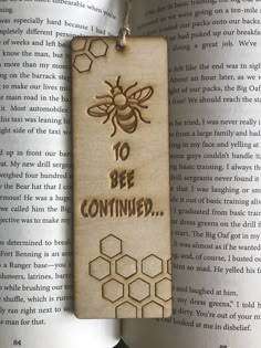 a bookmark that says to bee confined on it