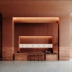 an empty kitchen with marble counter tops and cabinets