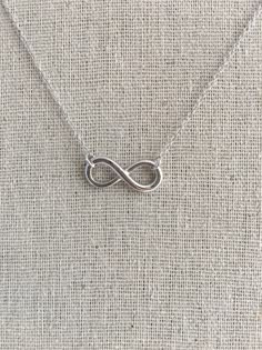 Sterling Silver Infinity Necklace Tsitp Infinity Necklace, Infinity Necklace Aesthetic, Silver Infinity Necklace In Dainty Style, Necklaces Infinity, Customizable Infinity Sterling Silver Necklace, Infinite Necklace, Silver Infinity Metal Necklace, Team Bonrad, Silver Infinity Necklace