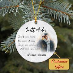 a personalized ornament hanging from a christmas tree with an image of a woman