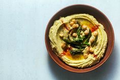 hummus with asparagus and chickpeas in a bowl