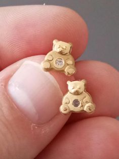 Beautiful Teddy Bear Yellow Gold Stud Earrings for girls or women, small and delicated, with small "diamonds", white zirconias, super shiny, in 18 Karats solid Gold / Au750.  They have screw back clasps to a more secure wear, preventing accidental loss, and are also very confortable to sleep with, because the back spike of the earrings will be covered and won't poke the side of your head or neck. Brand new, great for gifts because i will send them in our jewellers box, with Polishing Cloth and c Cute Gold Sterling Silver Earrings, Cute Hypoallergenic Earrings For Anniversary, Small Gold Cute Earrings, Bear Earrings, Gold Stud Earrings, Gold Stud, Girls Earrings, Jewelry Earrings Studs, Wedding Shop