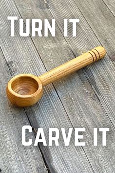 a wooden spoon sitting on top of a wooden table