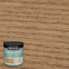 a can of minwax color wash sitting on top of a wood flooring