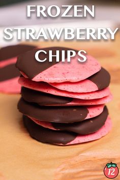 frozen strawberry chips stacked on top of each other with text overlay reading frozen strawberry chips