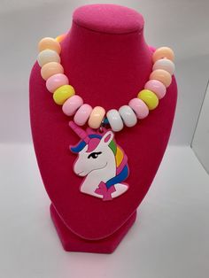 This cute necklace is made by my 3 yr old Niece Arya. She is making jewelry to help pay for her ballet classes. She puts the beads on the necklace all by herself and her mom ( my sister) only helps if she needs it. They are made with a stretchy rubber snap together necklace. The unicorn charms are also made of a rubber like material.  Arya thanks you for looking at her necklace.  Be sure to check out the rest of the shop too💕 Ballet Classes, Unicorn Charm, Unicorn Necklace, Ballet Class, Jojo Siwa, The Unicorn, Cute Necklace, Aesthetic Iphone, Birthday Gifts For Kids