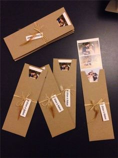 three brown envelopes tied with twine and some pictures