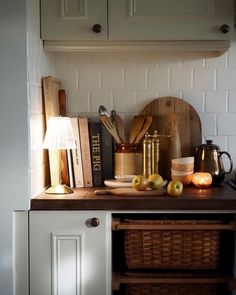 the kitchen counter is full of cooking utensils and other things to cook in