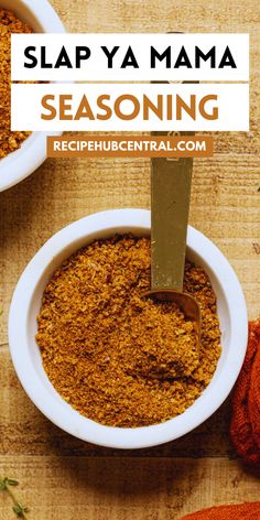 two white bowls filled with seasoning on top of a wooden table next to an orange towel