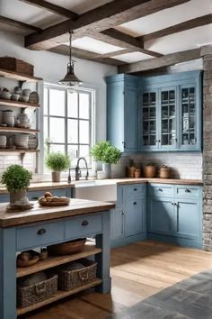 a large kitchen with blue cabinets and wooden floors is pictured in this image, there are baskets on the island