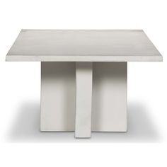 a white square table with two columns on the top and one column at the base