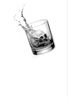 a drawing of a skull in a glass with water splashing from it's side