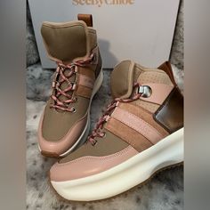 Clearance Sale ! Sale By Chlo , 37, 39 (Us Shoe Size), Pink/ Beige / Green, New With Box: A Brand-New, Unused, And Unworn Item (Including Handmade Items) In The Original Packaging (Such As The Original Box Or Bag) And/Or With The Original Tags Attached, Suede, Leather, Rubber, And Wool. Pink, Green And Beige 'Casey' Lace-Up High-Top Platform Sneakers From See By Chloe. Trimmed With Leather. Decorated With A Perforation. Logo Embossed On The Side. Silver-Tone Inlay And A Sewn-On Strap At The Back Pink High-top Sneakers For Walking, Pink Low-top Leather Boots, Pink Leather Low-top Boots, Multicolor High-top Platform Sneakers With Contrast Sole, Brown Lace-up Platform Sneakers With Contrast Sole, Brown High-top Platform Sneakers With Textured Sole, Sporty Lace-up Platform Sneakers With Removable Insole, Beige Lace-up Platform Sneakers With Rubber Sole, Chloe Shoes