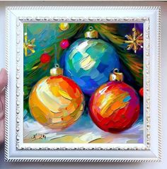 a painting of two christmas ornaments in front of a tree