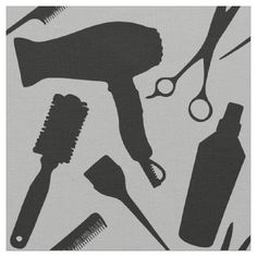 a black and white image of hair care items on a gray background with scissors, combs, and bottles