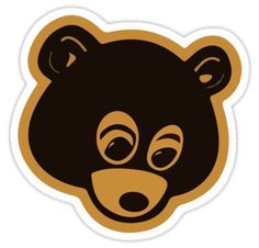 a black and brown bear head sticker on a white background, with eyes wide open