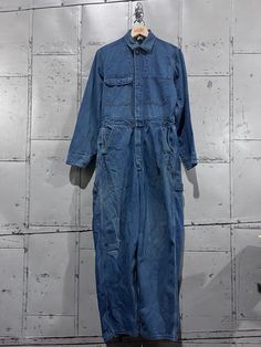 Vintage 1960s coveralls in distressed condition.  Marked Size 36. Please review measurements as some vintage items fit smaller than modern sizing. Measurements taken with garment laid flat: 19" across from armpit to armpit 16" across waist 19" across hips 29" inseam, from intersection to hem 14" rise, from intersection to top of waist 23" sleeve length Please send a message if you have any questions. Double check measurements and inspect all pictures carefully before purchasing. Orders ship via