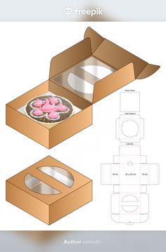 an open box with a pink frosted cupcake in it and the inside is cut out