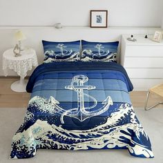 a bed with an anchor and waves on it in a white room next to a night stand