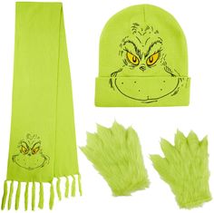 a green scarf, hat and gloves with grin face drawn on the front in yellow