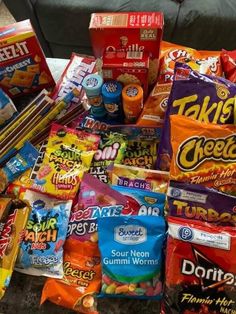 a pile of snacks sitting on top of a table