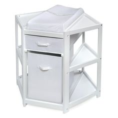 a white wooden night stand with two baskets on the bottom and one drawer open to reveal a bed sheet