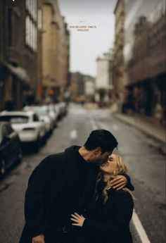 a man and woman embracing on the street