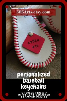 personalized baseball keychains with red and white stitching on the inside of them