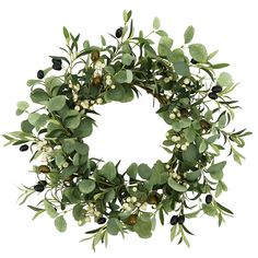 a wreath with green leaves and white berries