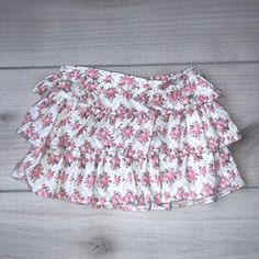 Janie & Jack Pink Floral Corduroy Ruffled Skirt. Pull on elastic waist. Size 3-6 months. Soft cotton corduroy. Excellent Used Condition Spring Ruffled Bottoms For Playtime, Spring Playtime Ruffled Bottoms, Spring Cotton Skirt For Playtime, Cute Ruffled Bottoms For Playtime, Cotton Skirt For Playtime In Spring, Spring Playtime Cotton Skirt, Cute Cotton Mini Skirt With Ruffles, Cute Cotton Ruffled Skort, Cute Cotton Ruffle Skirt