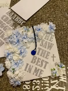 a graduation cap decorated with flowers and the words save the best in me