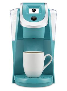 a coffee maker with a cup on it