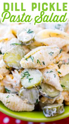 dill pickle pasta salad in a green bowl on a red and white tablecloth