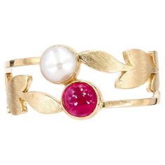 14k gold ring with ruby and pearl. Genuine ruby cabochon and pearl ring in 14k gold. Toi and moi ring with ruby and pearl Metal: 14k gold Weight 2.35 gr depends from size Gemstones Ruby round cabochon cut, 0.5 ct, transparent, red color. Freshwater cultivated pearls - 5 mm., white color, button form Ruby And Pearl Engagement Ring, Pearl And Ruby Ring, Fine Jewelry Ruby Cabochon Ring, Heirloom 14k Gold Ruby Ring With Cabochon, Ruby And Pearl Ring, Gold Ring With Ruby, Yellow Gold Cabochon Ruby Ring, Ruby And Pearl, Ring With Ruby