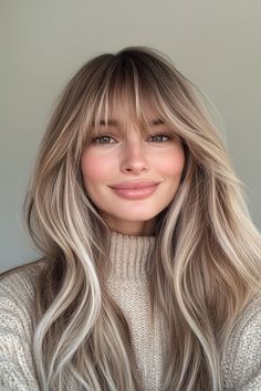 7. Champagne Blonde with Long Feathered Layers (Long Layered Hair With Bangs) - Long Layered Hair With Bangs Long Hair Feathered Bangs, Elle Bangs Hair, Long Fringe Long Hair, 70s Long Hair With Bangs, Root Smudge With Bangs, Light Blonde With Bangs, Medium Blonde With Bangs, Ash Blonde Curtain Bangs, Dark Blonde Balayage With Bangs