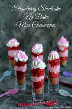 strawberry shortcake mini cheesecakes with whipped cream and red velvet frosting on top