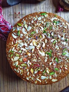 a cake with nuts and other toppings on it