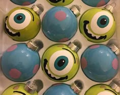 some green and blue ornaments with eyes on them