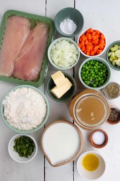 the ingredients for this dish are laid out in bowls