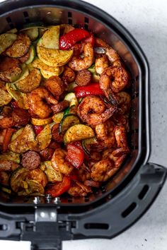 the food in the air fryer is cooked and ready to be put into the oven