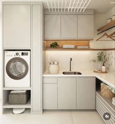 a washer and dryer in a small kitchen